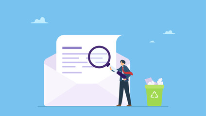 Businessman scan email with magnifying glass throw junk mail into bin. Email scan for cyber security, data protection or junk mail, online communication technology, safety and protection.