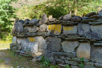 Ancient Stone Wall With Tibetan