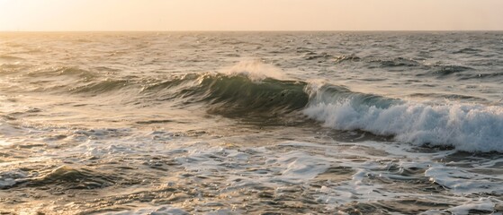 Golden Hour Ocean Wave Breaking with Sunlit Water Texture