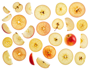 Sliced and quartered fruit arrangement, mostly circles and segments, on black