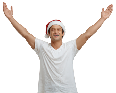 Happy and joyful indian man celebrating christmas holiday season. Young adult wearing santa hat and white t shirt with arms raised, isolated on transparency background