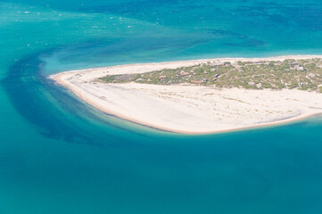Aerial photograph of a small peninsula jutting out from the Mozambique coastline.