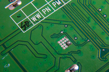 green electronic printed circuit board with assembled radio components