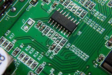 green electronic printed circuit board with assembled radio components
