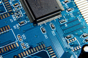 blue electronic printed circuit board with assembled radio components