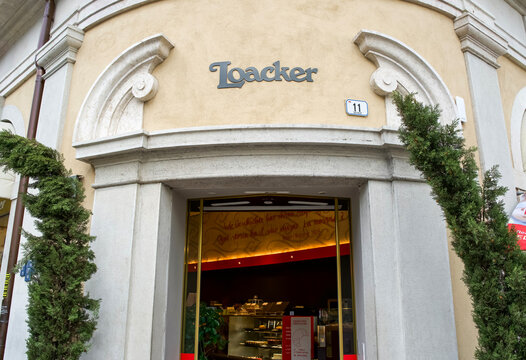 Alto Adige, Italy - July 03, 2025: Loacker storefront with elegant architecture and inviting entrance showcasing delicious pastries and desserts