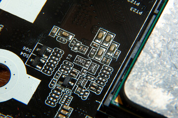 A close-up view of an electronic printed circuit board with assembled radio components