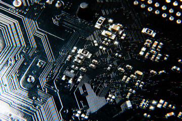 A close-up view of an electronic printed circuit board with assembled radio components