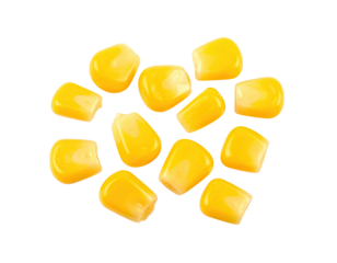 Isolated overhead shot of bright yellow corn kernels on a stark black background