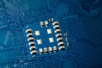Close-up of a blue electronic circuit board