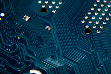 Close-up of a blue electronic circuit board