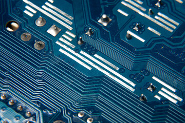 Close-up of a blue electronic circuit board