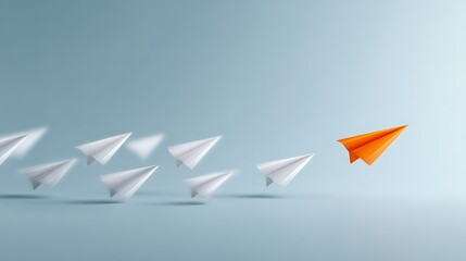 Orange Paper Airplane Leads White Paper Airplanes Against a Light Blue Background Minimalist Concept