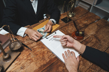 Person receiving money for contract agreement in legal context
