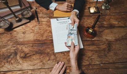 Client paying attorney for legal contract agreement