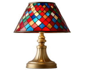 Classic stained glass table lamp with colorful mosaic shade creates warm, cozy light. This elegant vintage decor piece adds charming ambiance to any interior