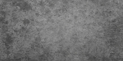 A rough, dark gray concrete wall texture creates a grunge vintage surface pattern © dark chocolate