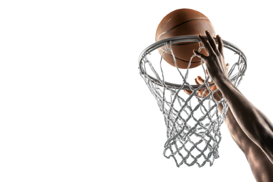 Slam dunk action shot with basketball going through the net for sports advertising or design use