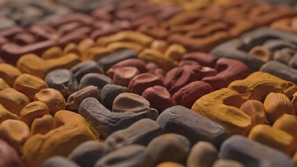 Close-up of Colorful Stone Carvings at an Archaeological Site - Powered by Adobe