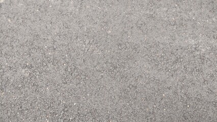 Close-up texture of fine black sand, ideal for backgrounds, textures, or design projects. The image captures the raw, natural feel of sand, making it perfect for designers, content creators, and marke