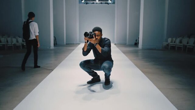 Photographer on a fashion catwalk.