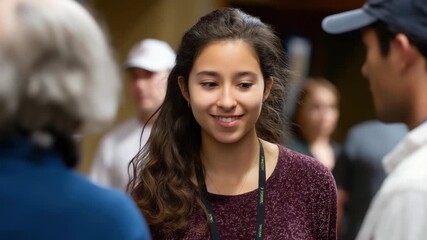A dynamic scene of individuals involved in conversation at a scientific exhibition, emphasizing collaboration, curiosity, and sharing of knowledge in an engaging environment.