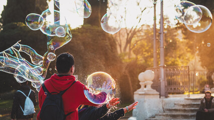 children playing with soap bubbles