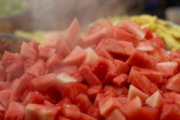 Juicy Diced Watermelon Buffet with Refreshing Cold Mist