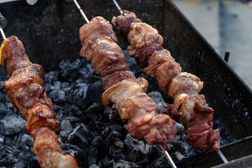 Traditional souvlaki skewers grilled on charcoal 