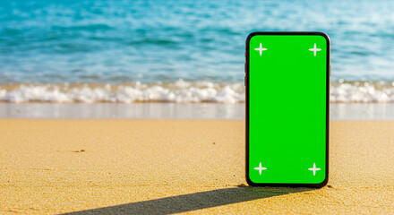 Stunning smartphone with green screen chroma key on sandy beach with ocean waves background
