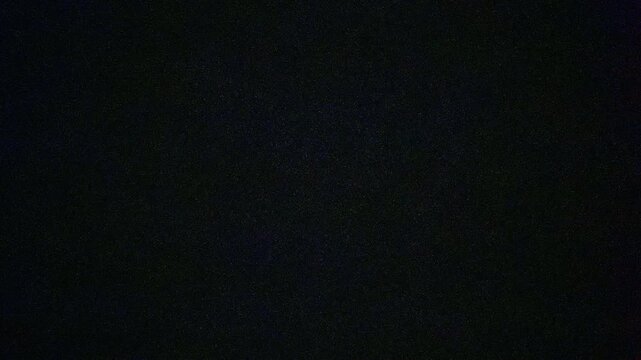 Static digital noise overlay creates retro glitch background texture for motion graphics and video projects