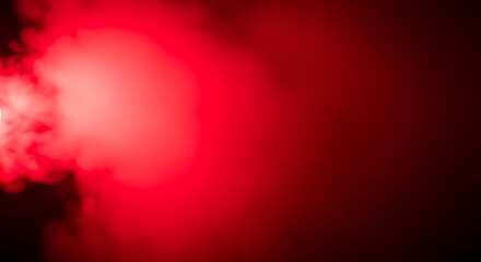 Red smoky fog effect with a light source on a dark background