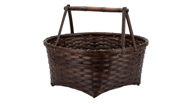 Brown woven basket with wooden handle for carrying items outdoors.