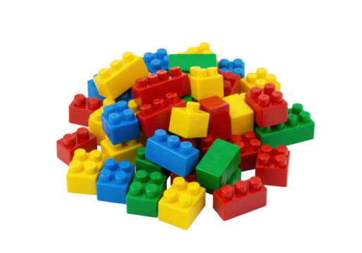 Isolated pile of colorful toy bricks, red, yellow, blue, green building blocks toys objects