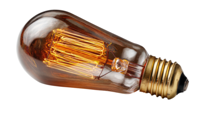 Close-up of a vintage, incandescent light bulb on a transparent background