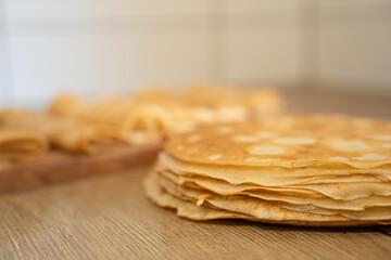 lots of pancakes on a plate 
