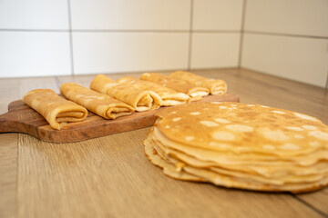 lots of pancakes on a plate 