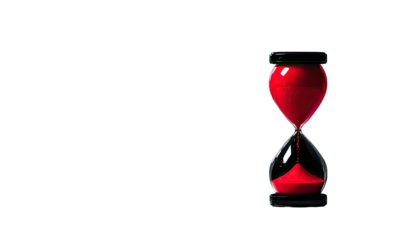 An hourglass filled with a deep red substance is silhouetted against a vast black background