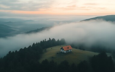 Secluded cabin nestled on a hilltop surrounded by misty forests and mountains, capturing the serenity of a tranquil morning in nature