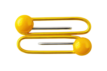 A stylized golden sculpture with a double-S shape and spherical accents on a black background