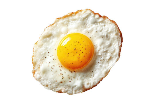 A perfectly cooked, sunny-side-up breakfast staple with pepper, set against black
