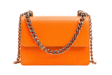 Bright orange shoulder bag with silver chain strap against a transparent backdrop