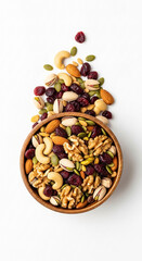 Healthy trail mix with nuts seeds and dried fruits in a bowl