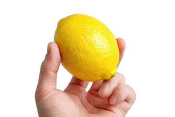 Hand holding a ripe yellow lemon, isolated on a stark black background, offering a close-up view