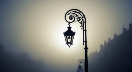 Mystic Silhouette A Streetlight Veiled in Atmospheric Fog