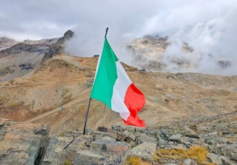 Monte Rosa (Italy) - A mountains view in Valsesia with Monte Rosa mount peak of Alps, alpinistic paths to Rifugio Modena and Capanna Margherita refuge, with snow glacier and alpinists.