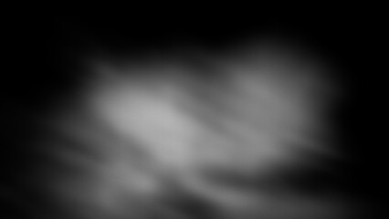 Abstract blurred background, light grainy spots in a dark frame.