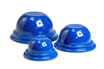 Three glossy, blue, rounded, bowl-like objects of varying sizes arranged together on a dark background