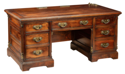 Wooden antique desk with multiple drawers and brass handles, featuring a leather top.