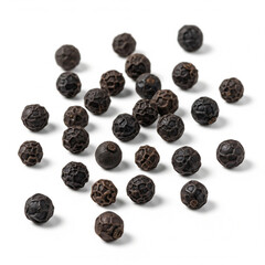 Black peppercorns scattered on white surface